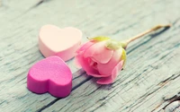 Delicate Pink Rose and Heart-Shaped Sweets