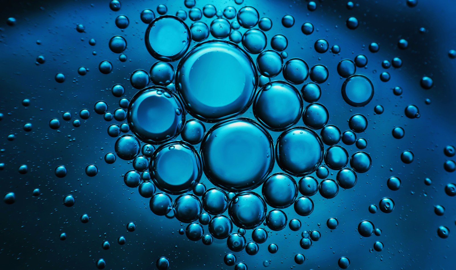 A close up of a blue liquid filled with bubbles (water, colorfulness, liquid, blue, nature)