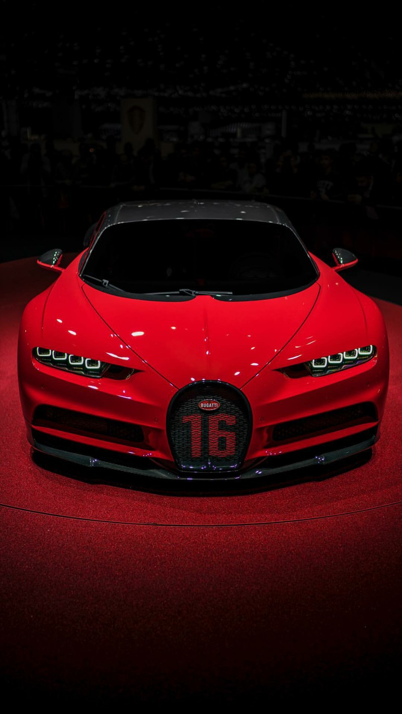 Краснаяbugatti на展示 в темной комнате (хирон, chiron, красный, машина, гиперкар)