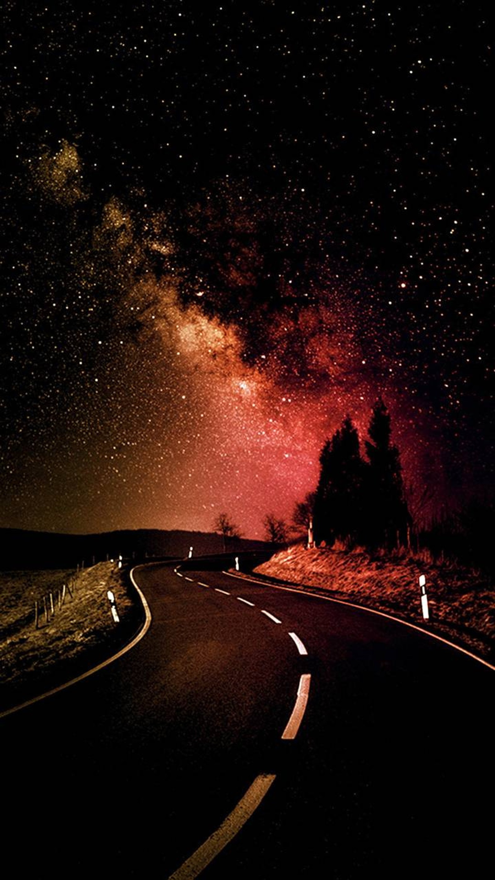 Arafed view of a road with a red sky and stars (road, night, infinity, sky, eternity)