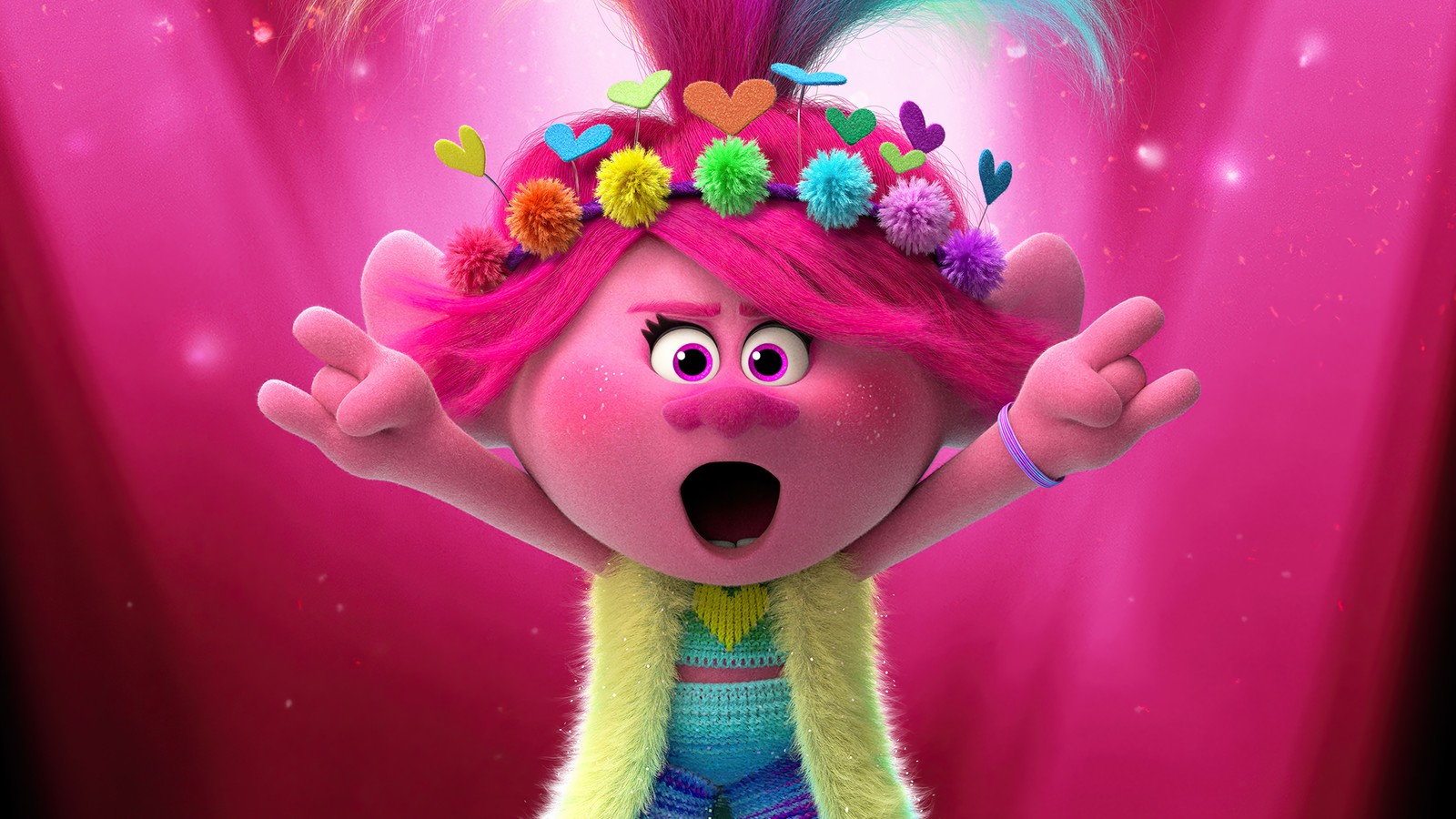 A close up of a cartoon character with pink hair and a colorful outfit (poppy, trolls world tour, trolls 2, movie, 2020)