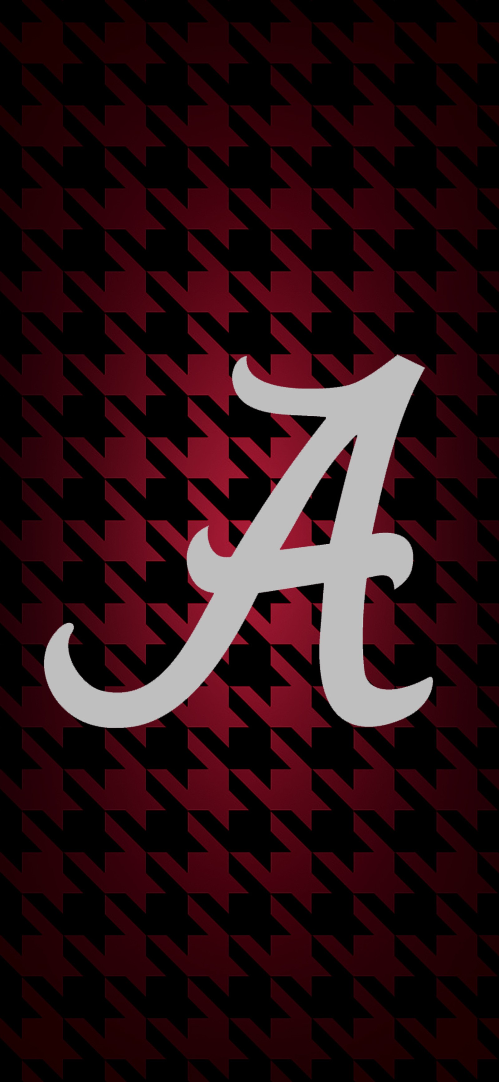 A close up of a red and black background with a white letter a (big al, bryant denny, crimson, houndsooth, nick saban)