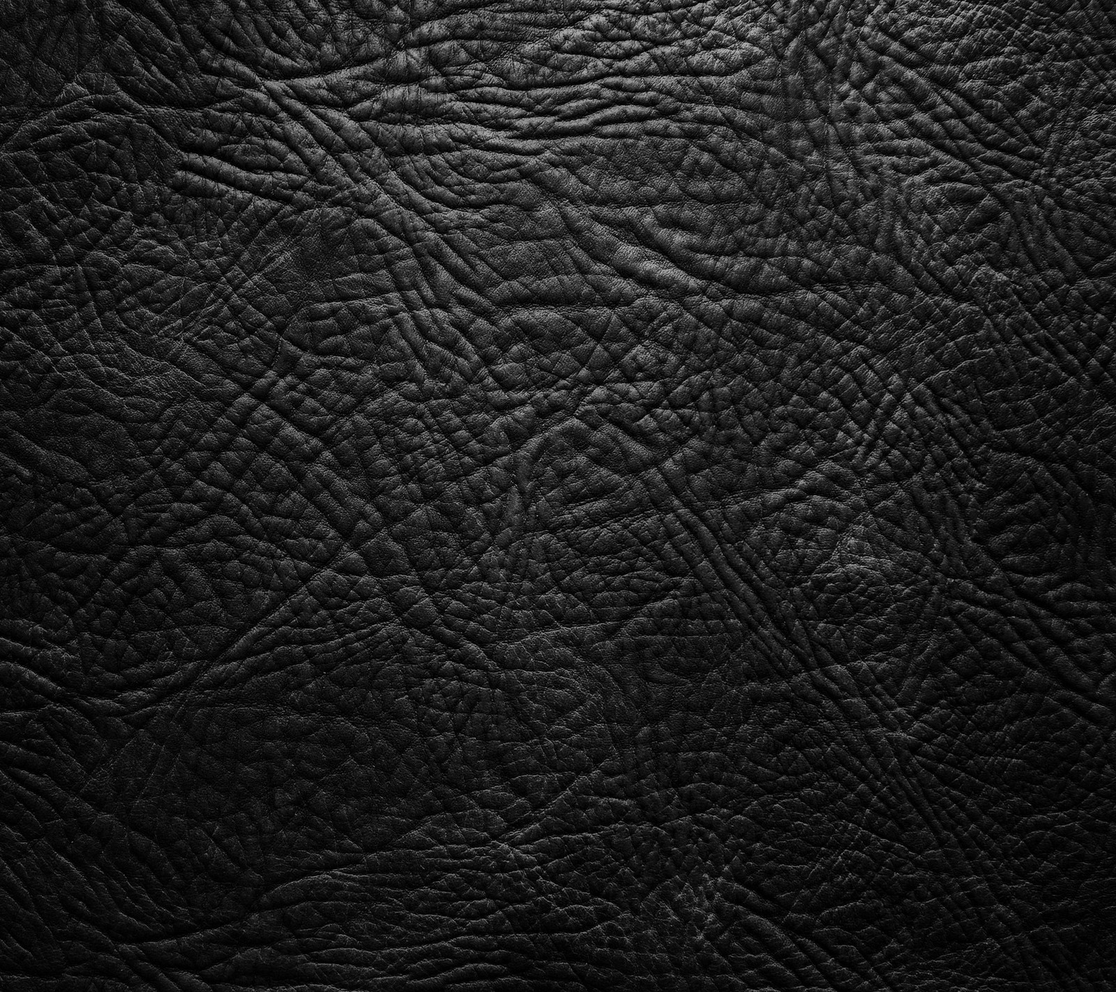 Black leather texture background with a very detailed pattern (abstract background, leather design black)