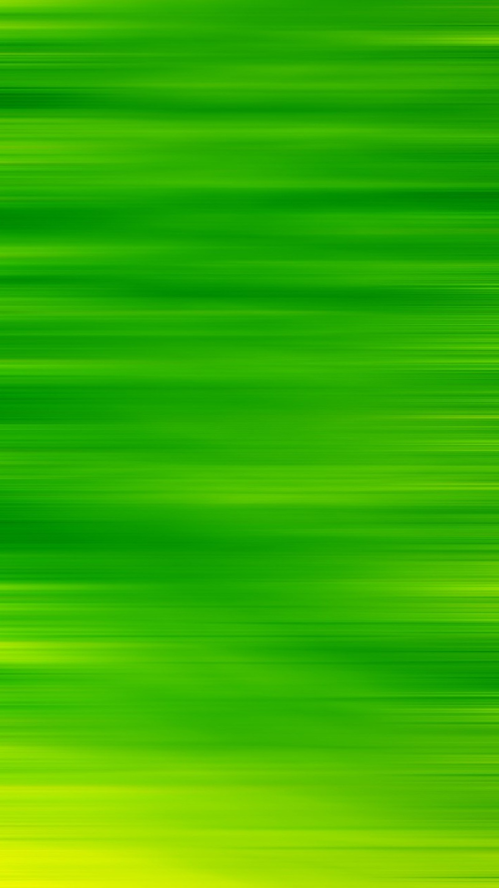 A close up of a green background with a blurry image of a person (abstract, awesome, clours, colours, cool)