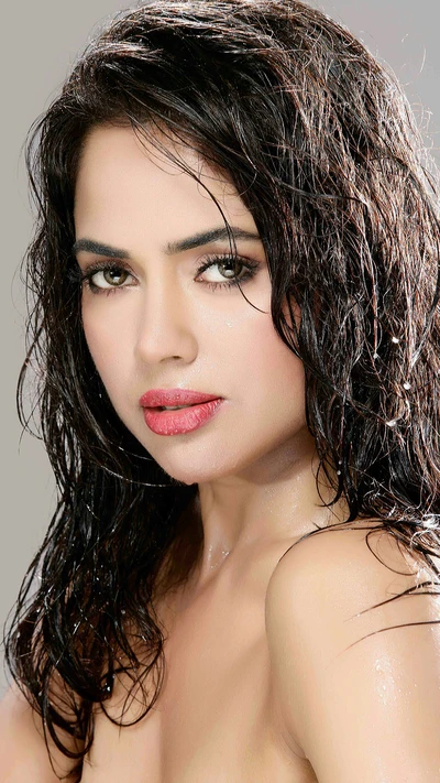 Radiant Bollywood Actress with Wet Hair and Captivating Expression