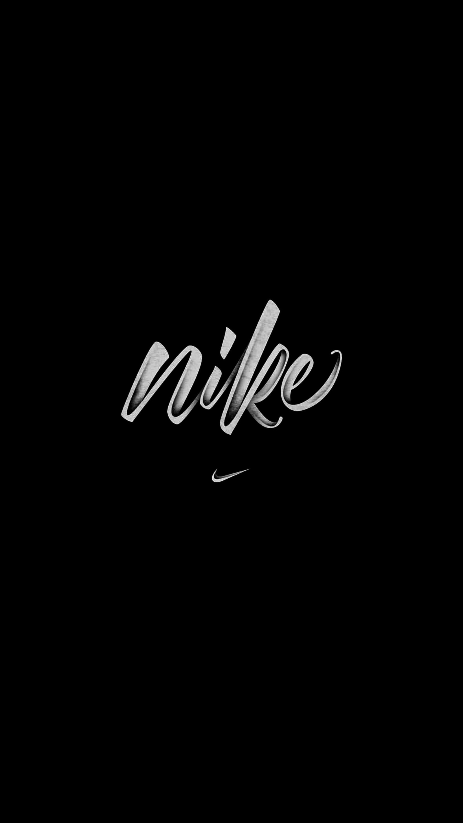 Un primer plano de un fondo negro con un logo en blanco y negro (nike, logotipo)