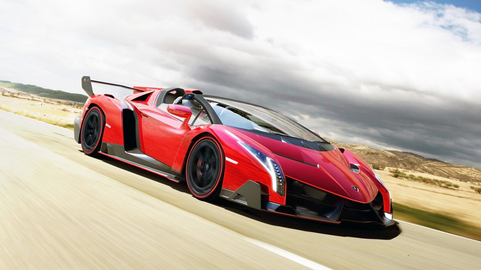 A close up of a red sports car driving on a road (lamborghini veneno, lamborghini, car, sports car, lamborghini aventador)