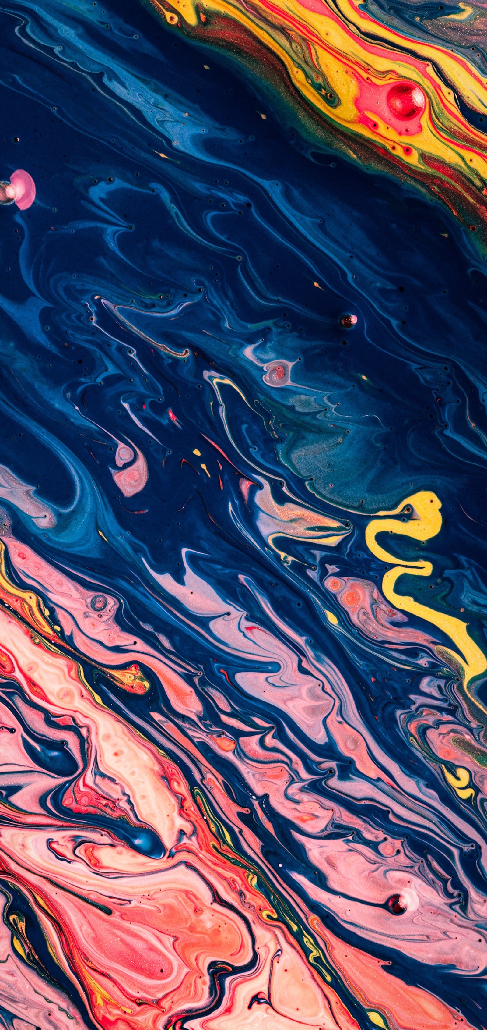 A close up of a colorful fluid painting on a surface (android, water, water resources, liquid, paint)