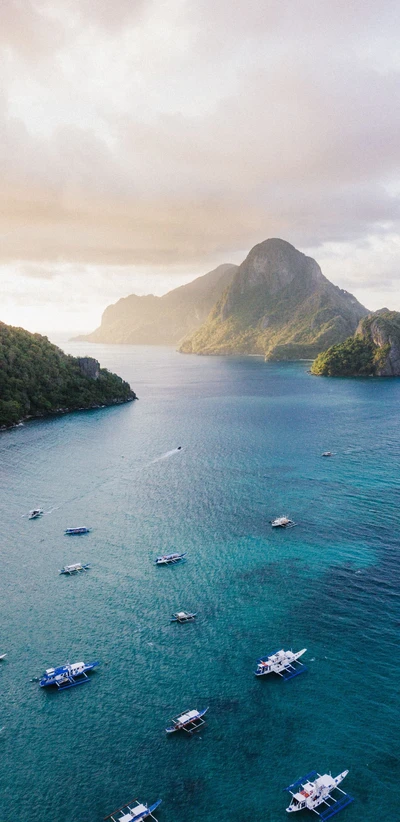 Tranquil Island Landscape with Azure Waters and Majestic Mountains