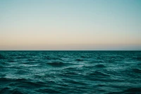 Tranquil Horizon Over Calm Ocean Waters