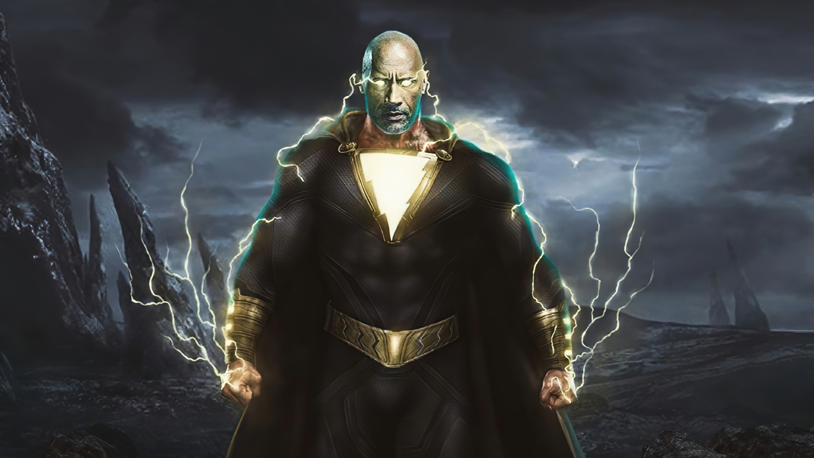 Hombre en un traje negro de pie frente a una montaña (black adam 2022, película, black adam)