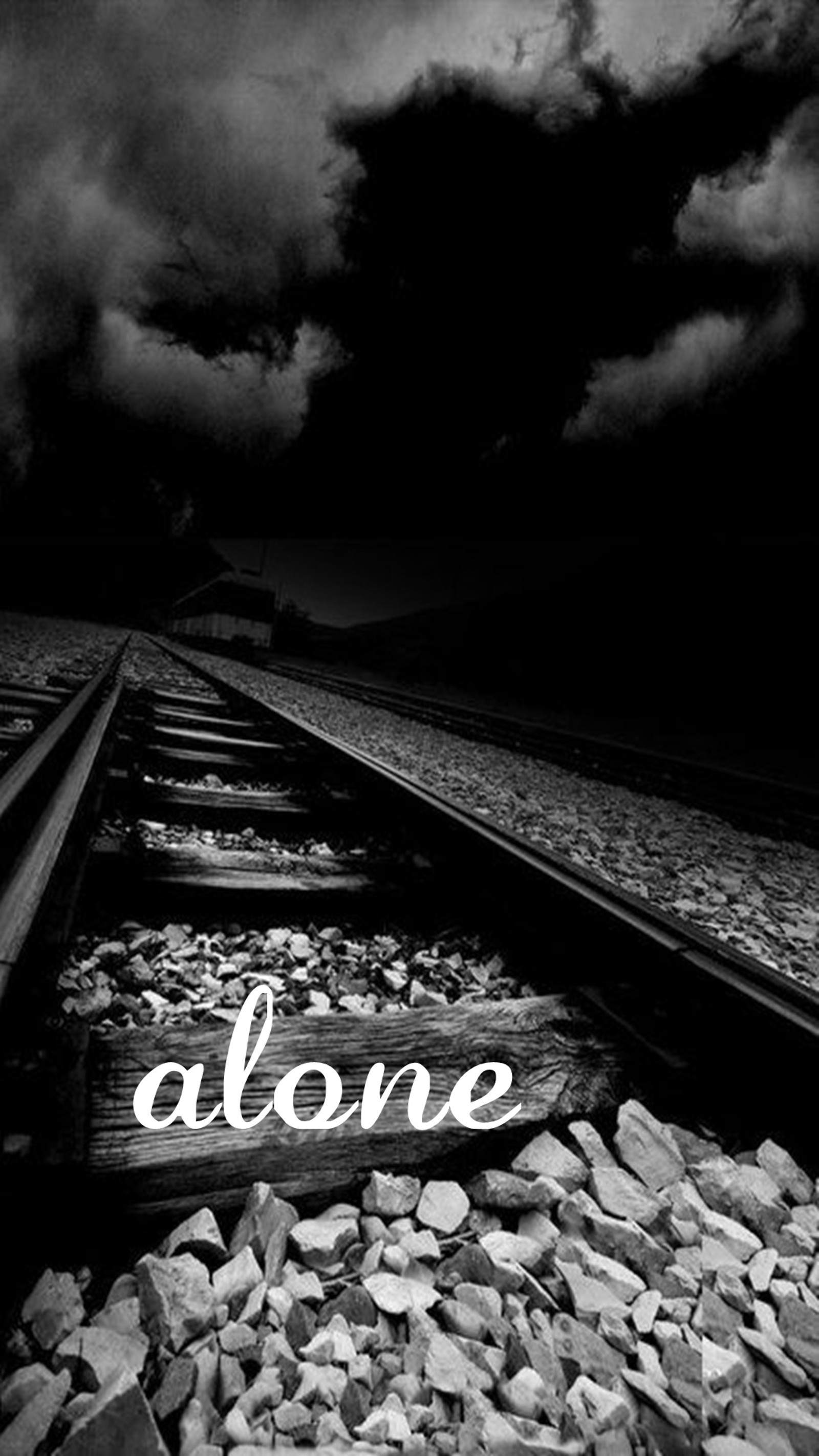 A black and white photo of a train track with the word alone written on it (alone, i miss you)