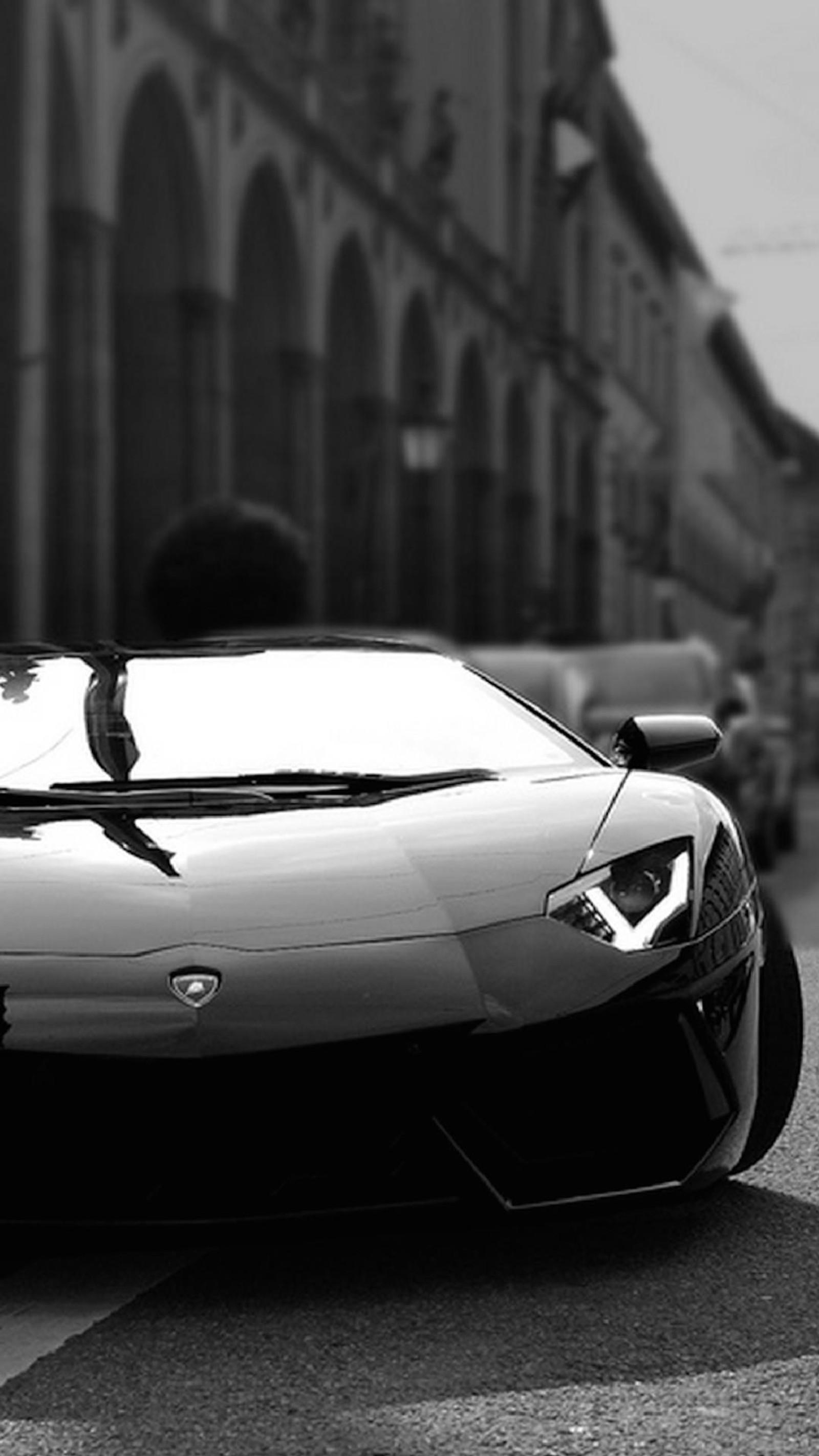 Gros plan d'une photo noir et blanc d'une voiture de sport (dfg, sfd)