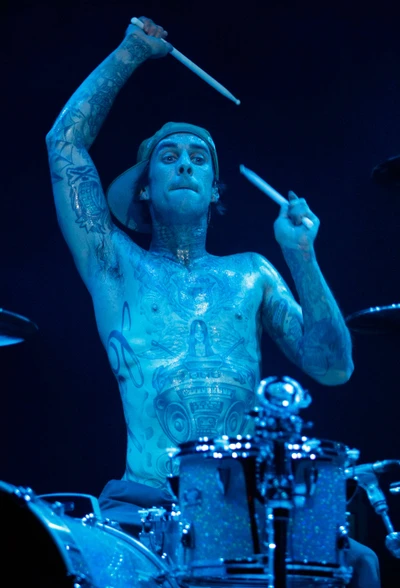 Dynamic Drummer in Electric Blue Light