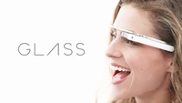 Embracing Innovation: A Smiling Woman Wearing Google Glass