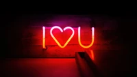 Neon 'Ich liebe dich' Schild vor dunklem Hintergrund