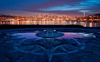 Paisagem urbana de Seattle à noite: Reflexos do horizonte e da Space Needle