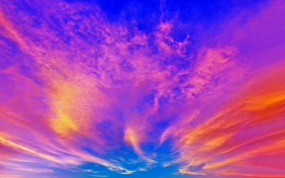 Vibrant Sky Afterglow: A Kaleidoscope of Blue and Purple Clouds