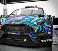 Ford Fiesta with vibrant anime-inspired graphics and GoPro camera, showcasing motorsport aesthetics.