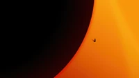 Silhouetted Figure Against a Cosmic Horizon in Dune