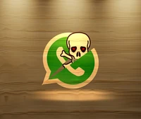 Aviso: Ícone de ameaça de segurança do WhatsApp com caveira