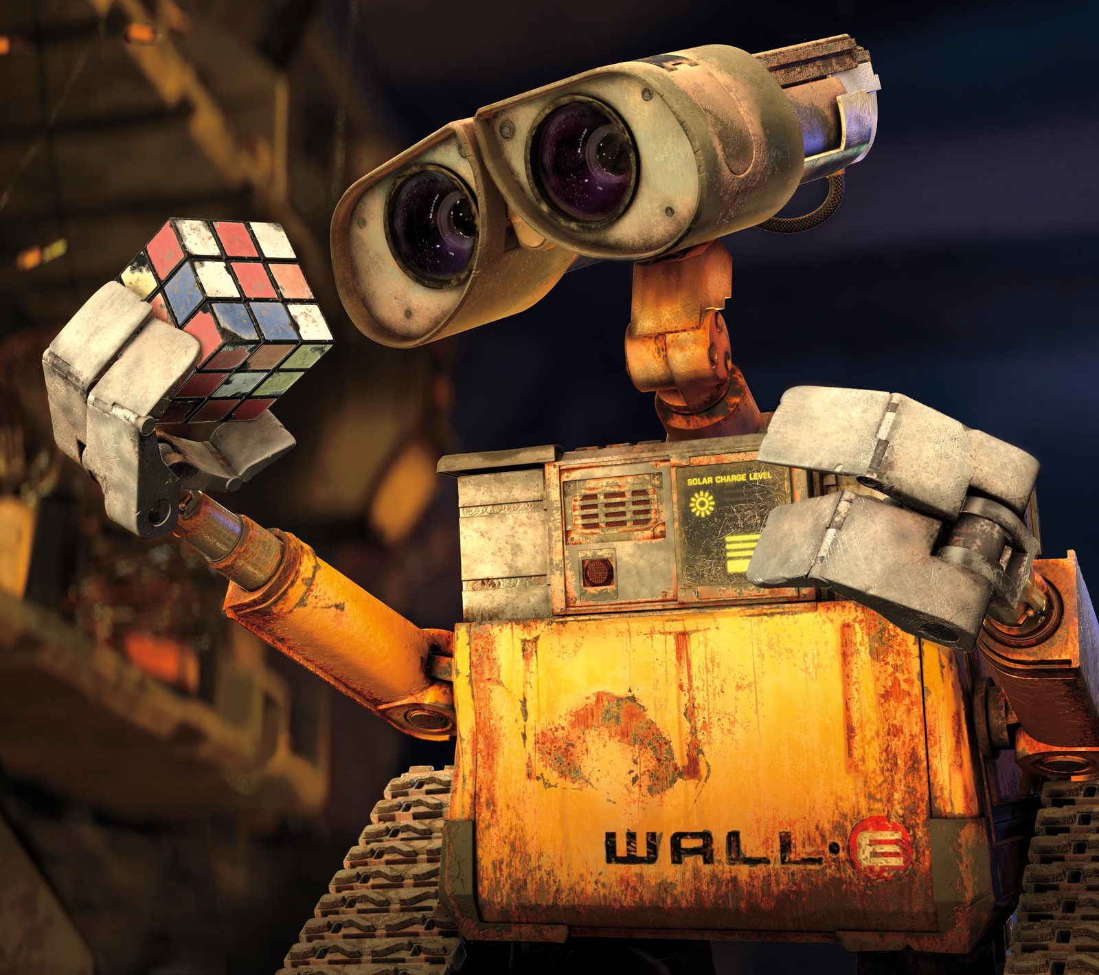 Um close-up de um robô com um cubo rubik na mão (disney, walle)