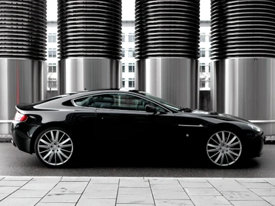 Elegante Aston Martin DB9 exhibido contra arquitectura moderna