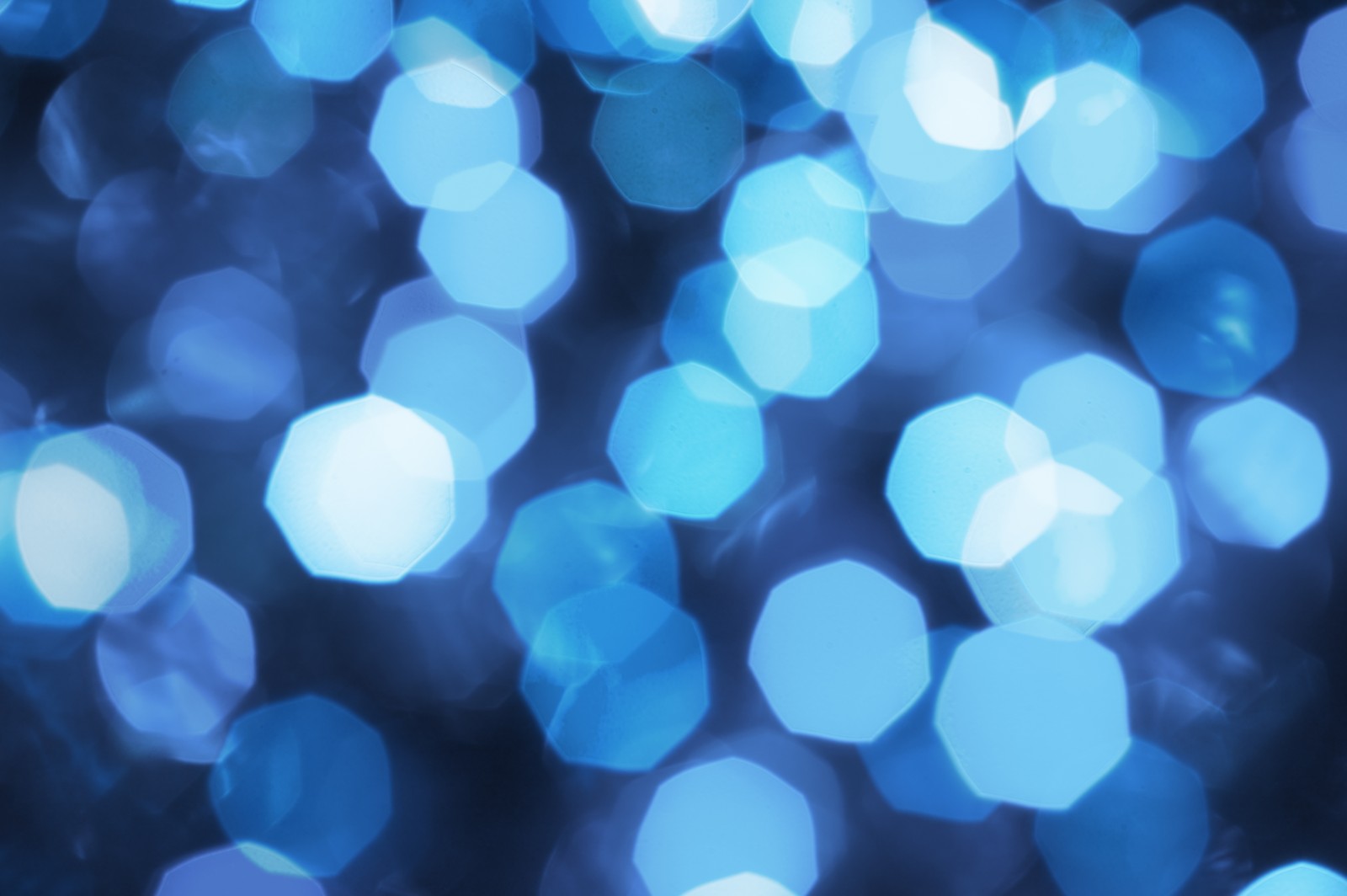 A close up of a blue and white bokeh background (blue, light, circle, sky, united states of america)