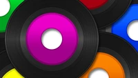 Discos de vinil coloridos com um centro roxo proeminente