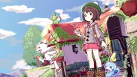 Pokémon-Trainer mit Scorbunny, Sobble und Grookey in einer malerischen Dorfszene