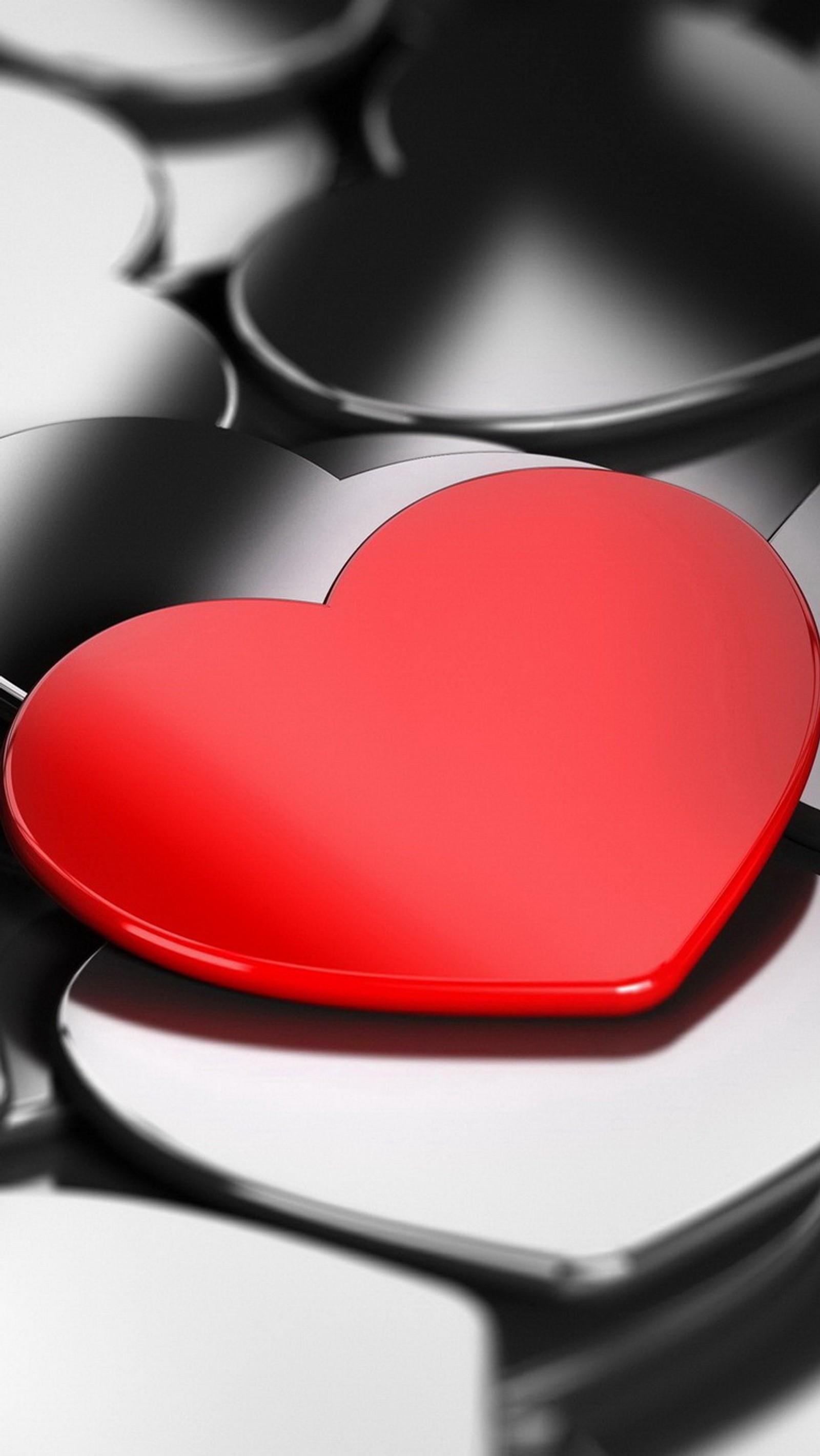 There is a red heart on a black and white background (background, chrome red, love hearts)