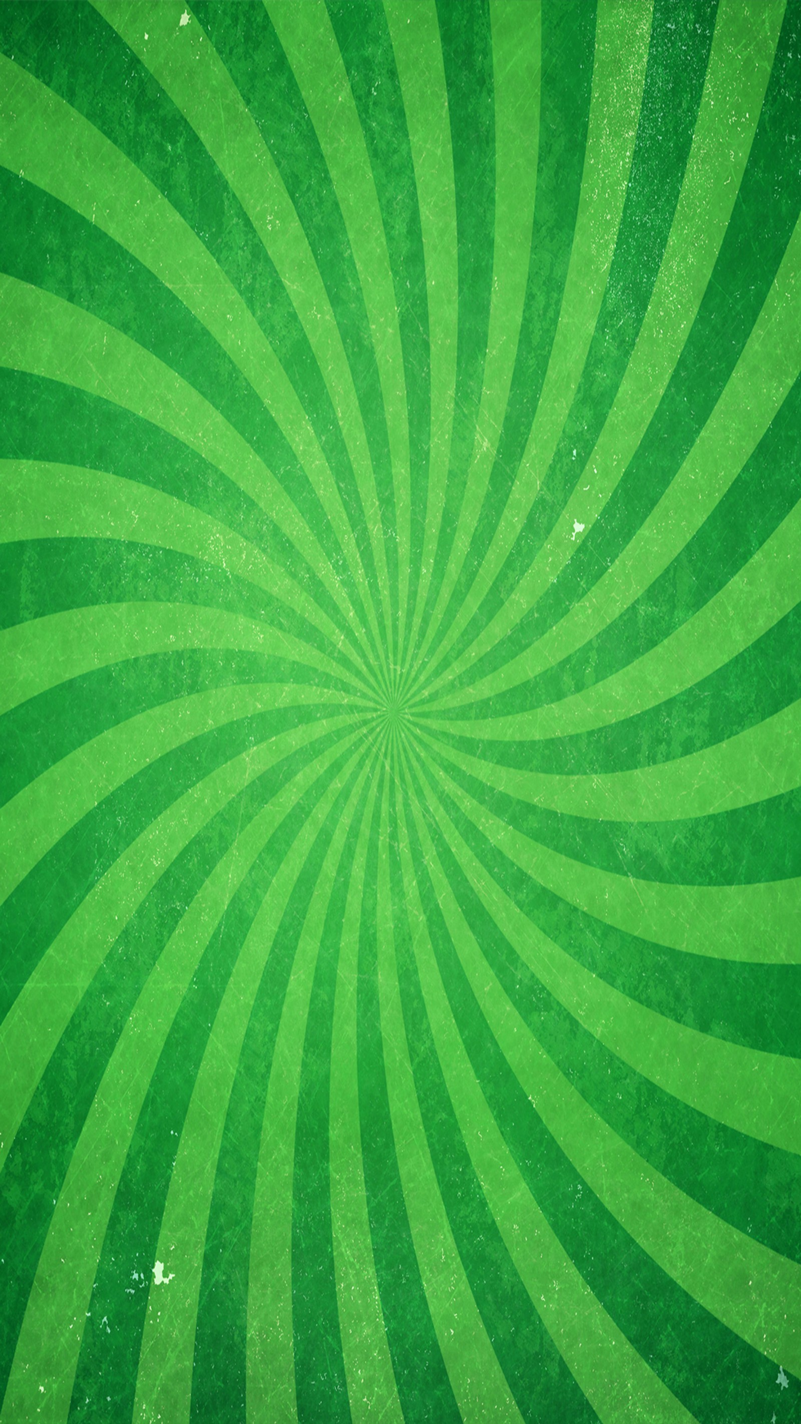 A close up of a green background with a swirl pattern (green, stripes)