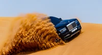 Rolls Royce Cullinan conquérant les dunes du désert