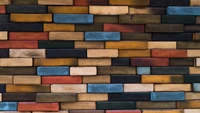 Bloques de madera apilados vibrantes en colores inspirados en la naturaleza