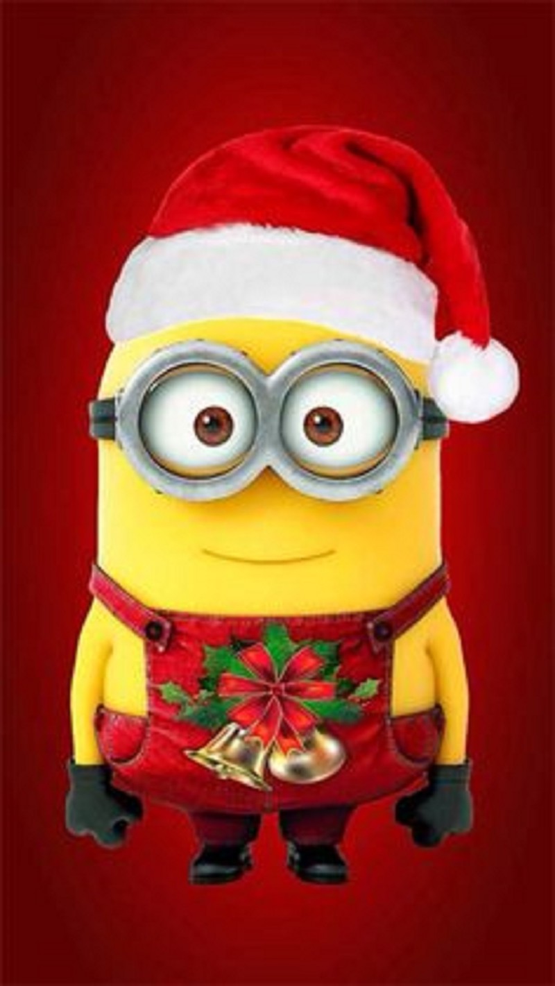 Un minion portant un chapeau de noël et tenant une cloche (cartoon, film)