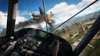 Vista de cockpit cheia de ação em Far Cry 5 com combate aéreo explosivo