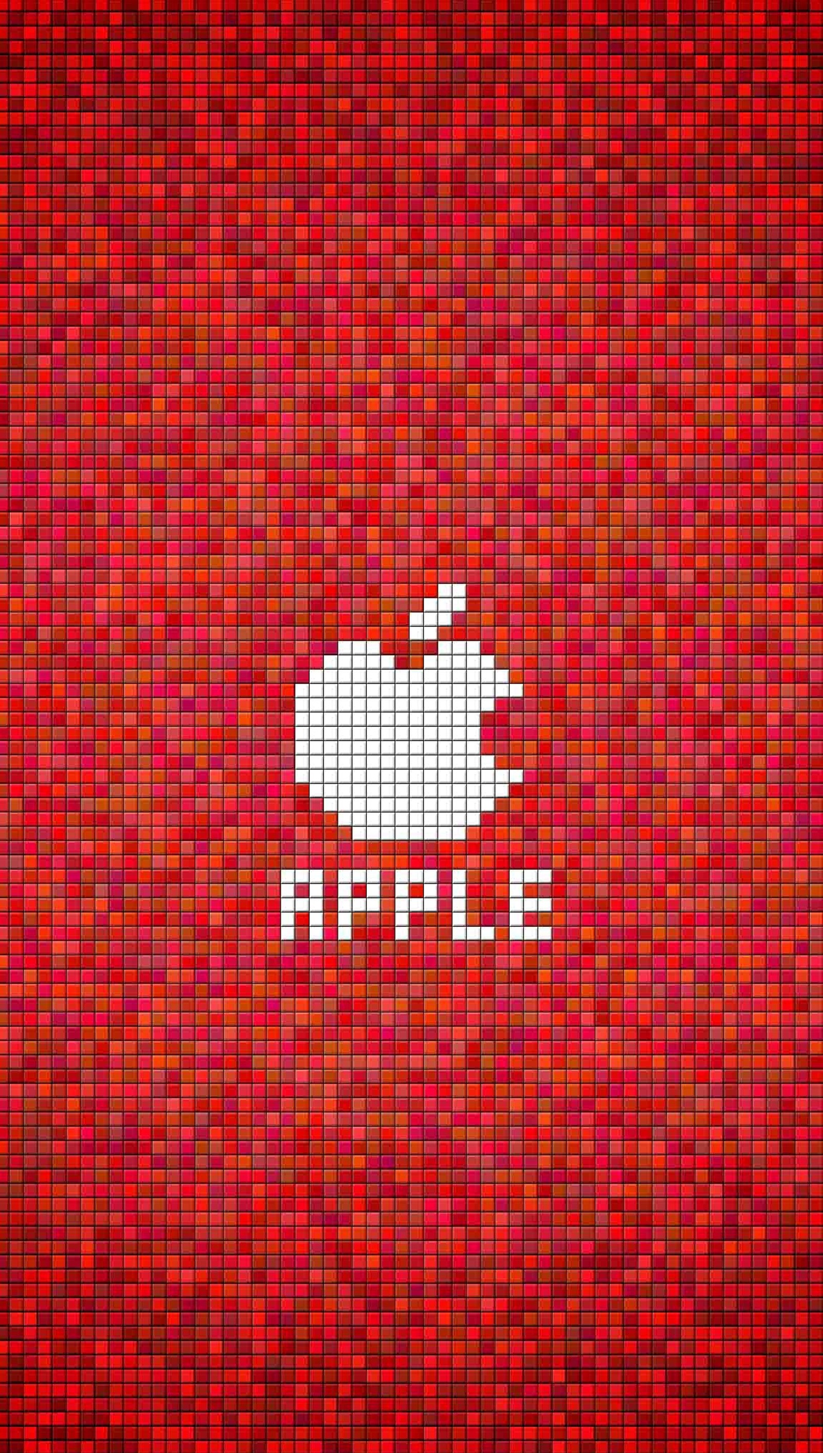 Un gros plan d'un mur en mosaïque rouge avec un logo apple blanc (pomme, logo)