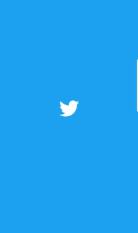 Um fundo azul vibrante com um logotipo de pássaro do Twitter branco, simbolizando conexão e comunicação.