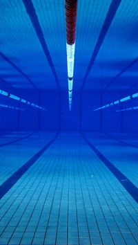 Neon Blue Serenity: Underwater Pool Perspective