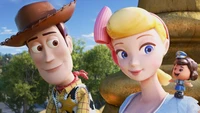 Woody, Bo Peep, and Officer Giggle McDimples from Toy Story 4