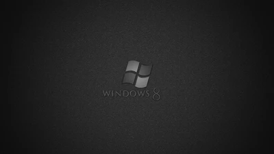 Черно-белый дизайн логотипа Windows 8 на текстурированном темном фоне.