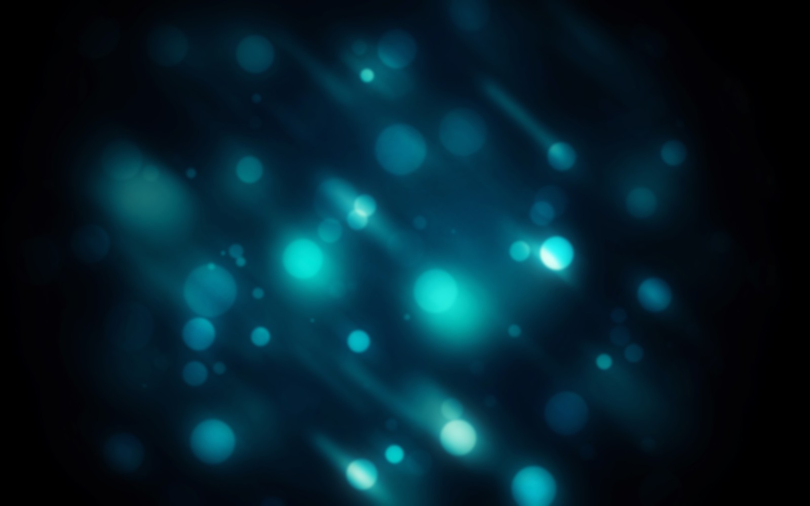 A close up of a blurry image of a blue background (light, bokeh, blue, turquoise, darkness)