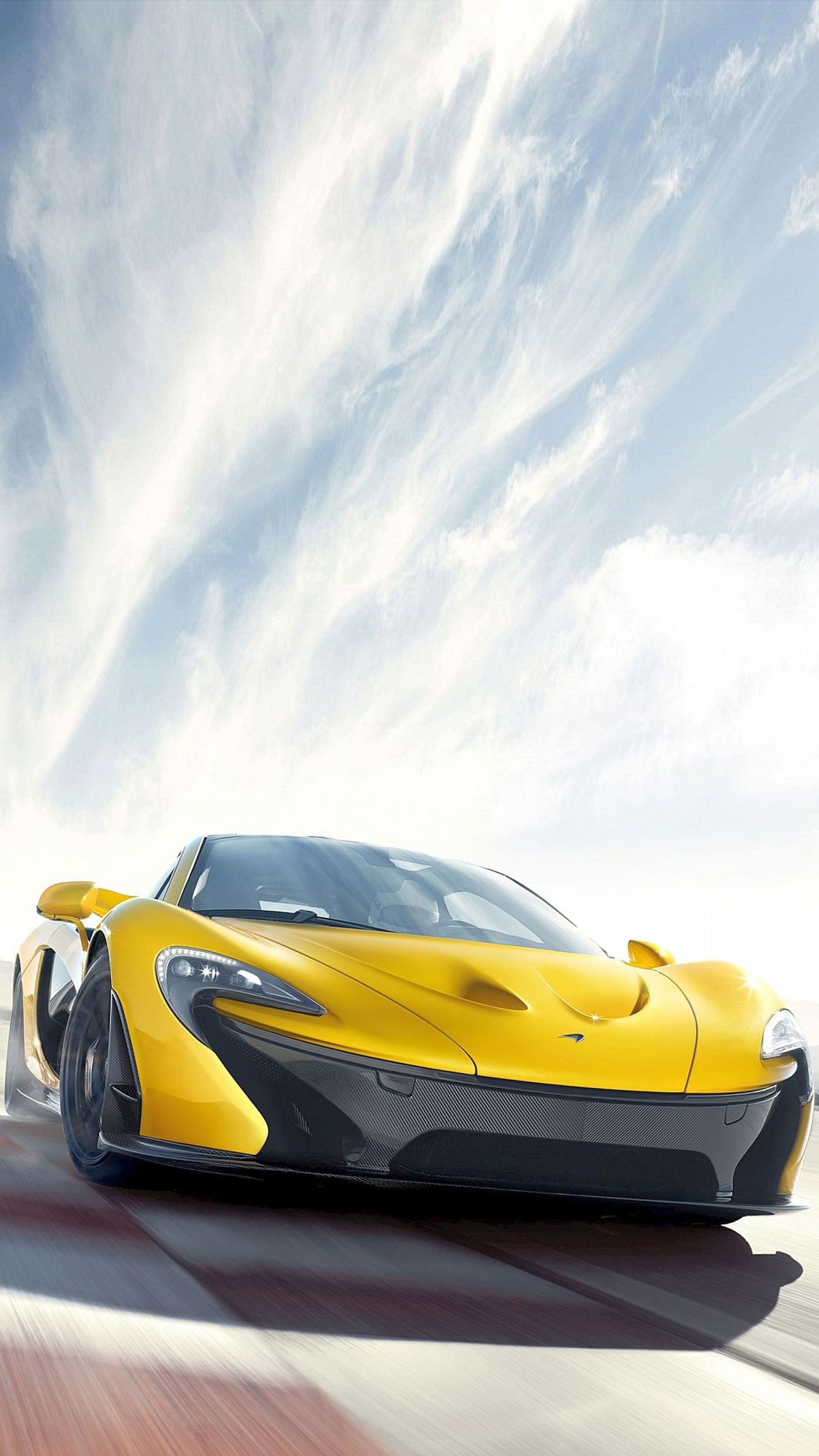 A close up of a yellow sports car driving on a track (supercar, the mclaren p1, yellow)