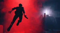 A character leaps through a vibrant haze of red smoke in a mysterious, dimly lit environment, embodying the essence of control in a video game.