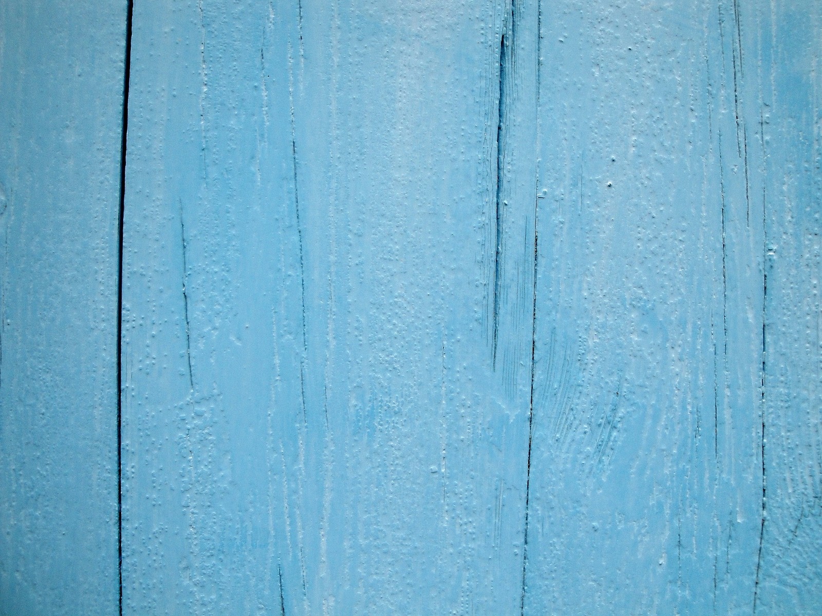 Un primer plano de una pared de madera pintada de azul con un mango negro (textura, madera, azul, turquesa, aqua)