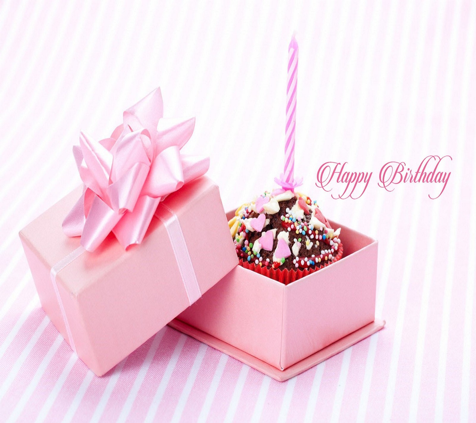 Pink box with a cake inside and a candle in it (birthday, gift, happy, wishes)