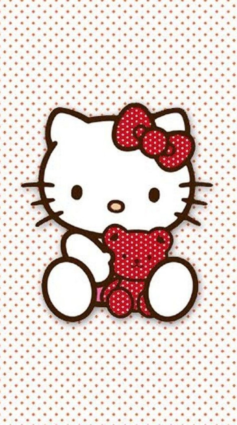 Крупный план hello kitty на фоне в горошек. (мультфильм, хелло китти, hello kitty)