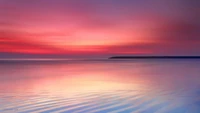 Serene Sunset Over Tranquil Sea