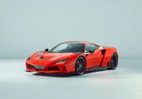 Novitec Ferrari F8 Tributo N Largo: Auffälliges rotes Sportauto auf weißem Hintergrund