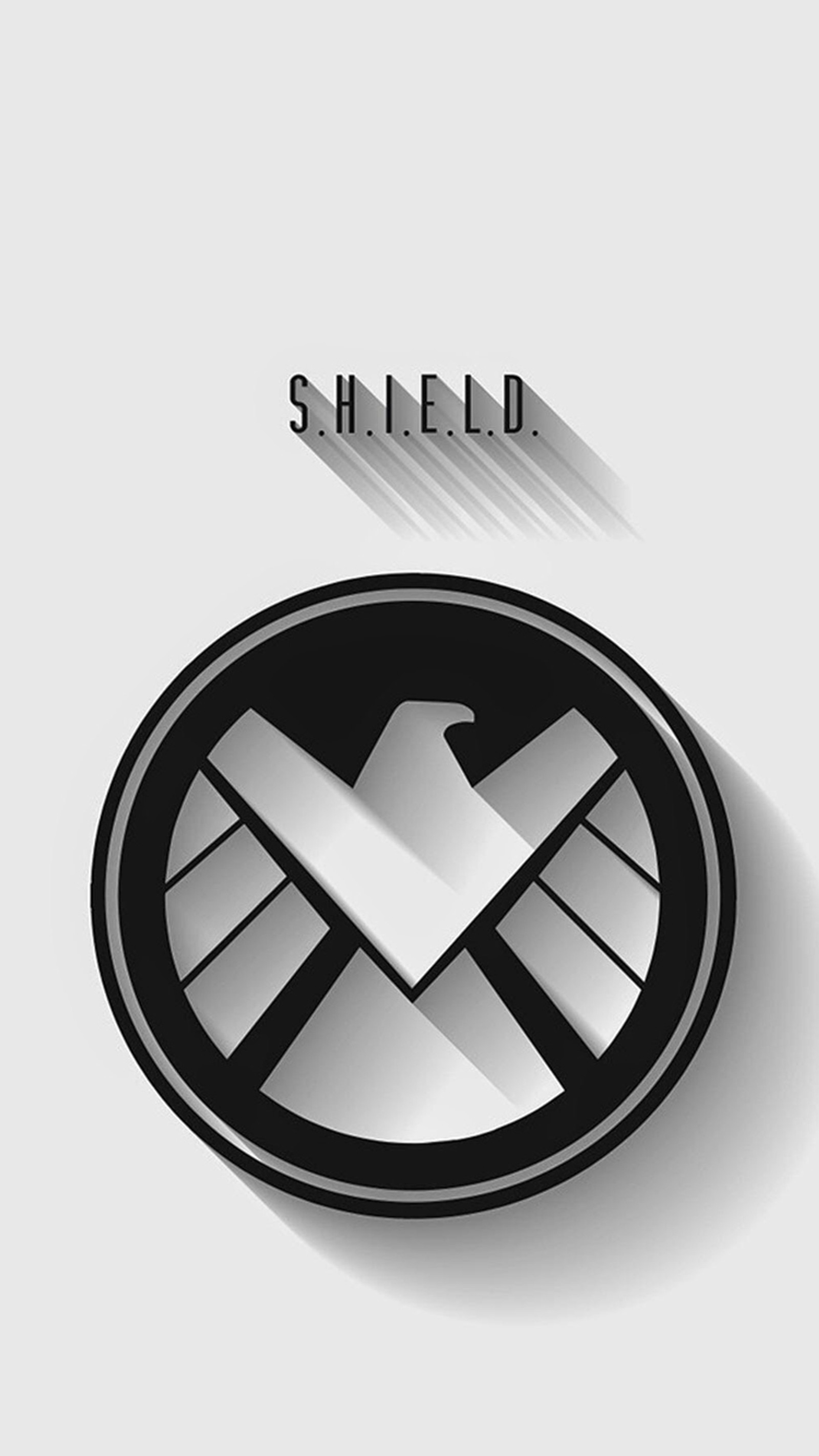 A close up of a shield logo on a white background (avengers, marvel, shield, superhero)